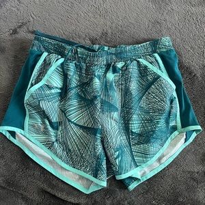 UNDER ARMOUR RUNNING SHORTS